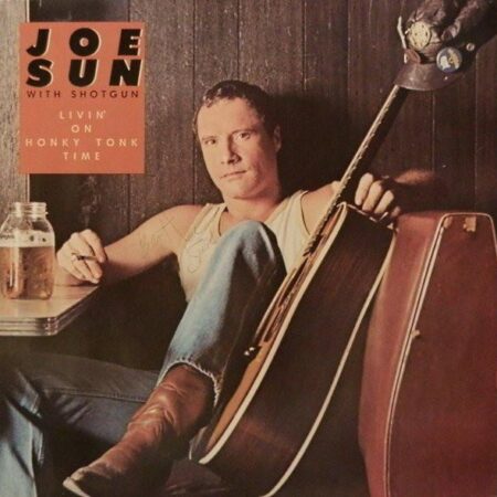 Joe Sun with shotgun. LivinÂ´ on honky tonk time